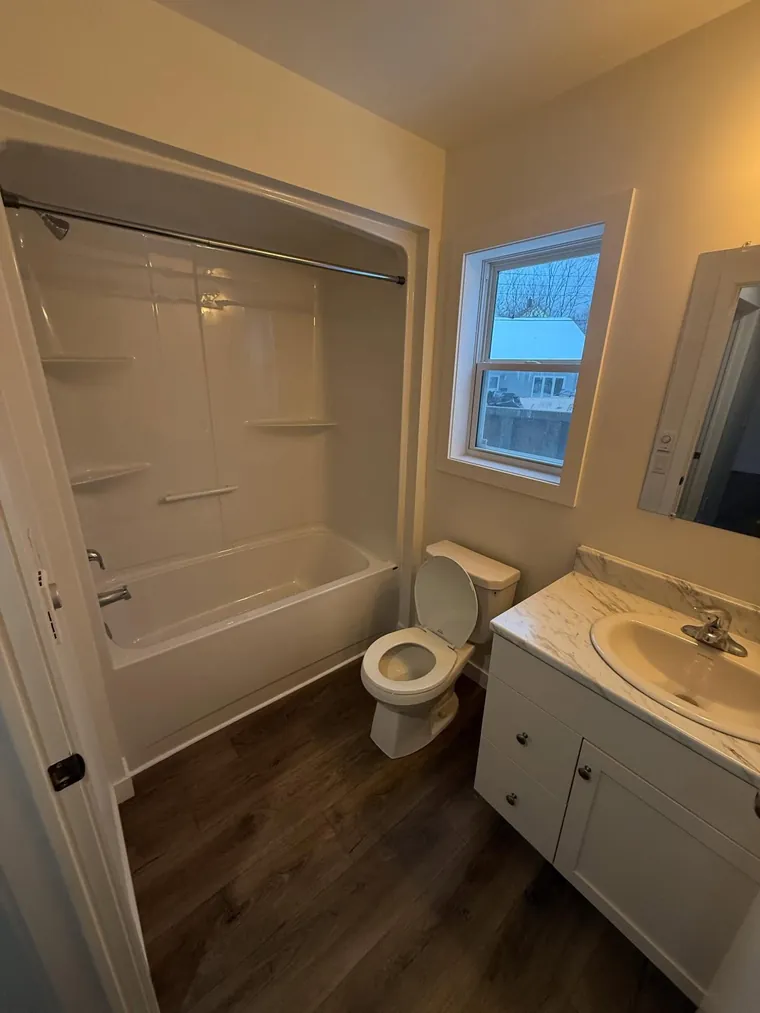 Renovated bathroom with new vanity and tub in Nova Scotia